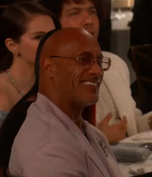 The Rock's reaction was tense (CBS)