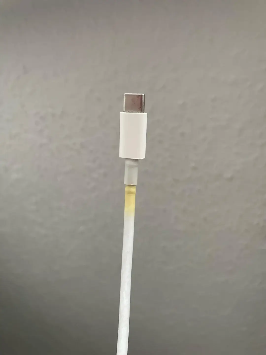 You might want to get a new charger if it's beginning to yellow.