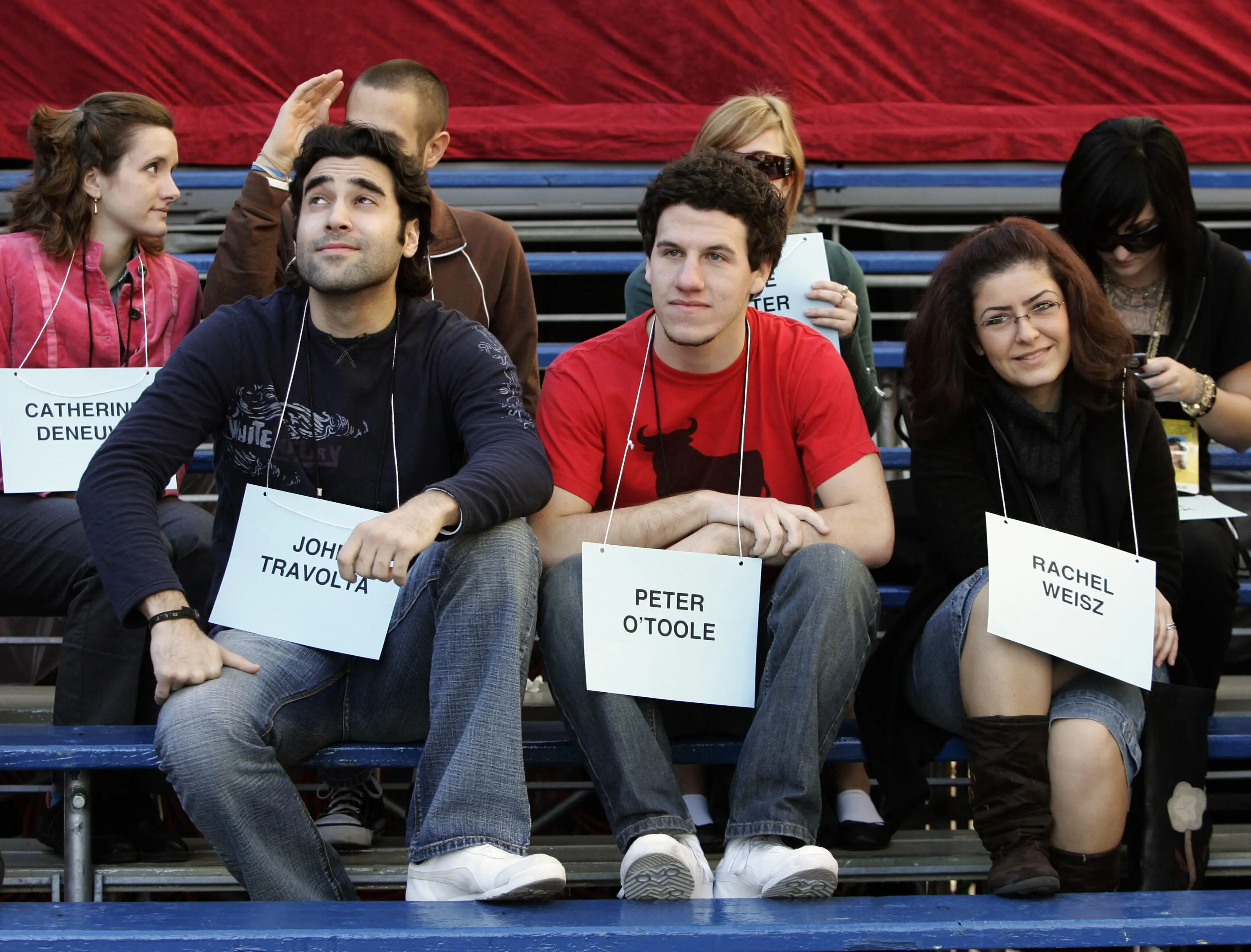 The seat-fillers are assigned specific seats, that isn't John Travolta (TIMOTHY A CLARY via Getty Images)