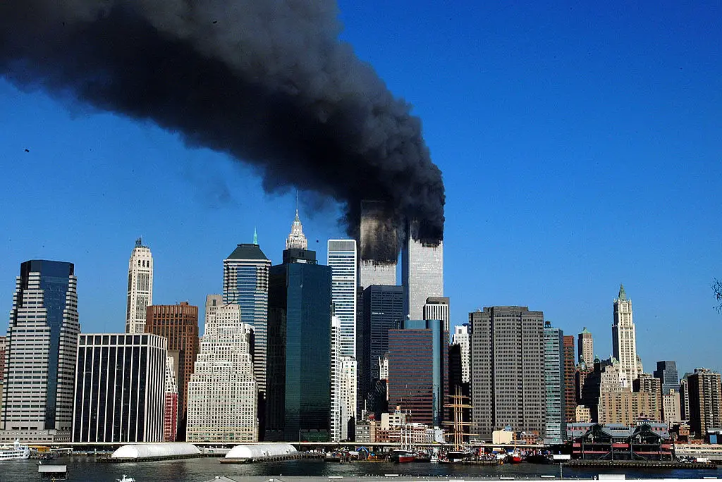 A view of New York with the World Trade Center burning (David Handschuh/NY Daily News Archive via Getty Images)