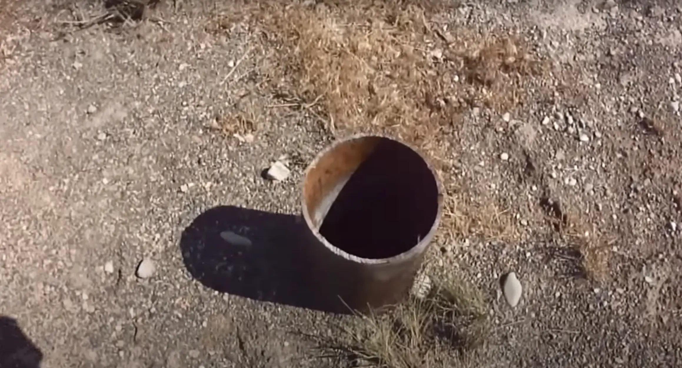 The hole was near a military base in the Utah desert. (Youtube/Dr. Ty)