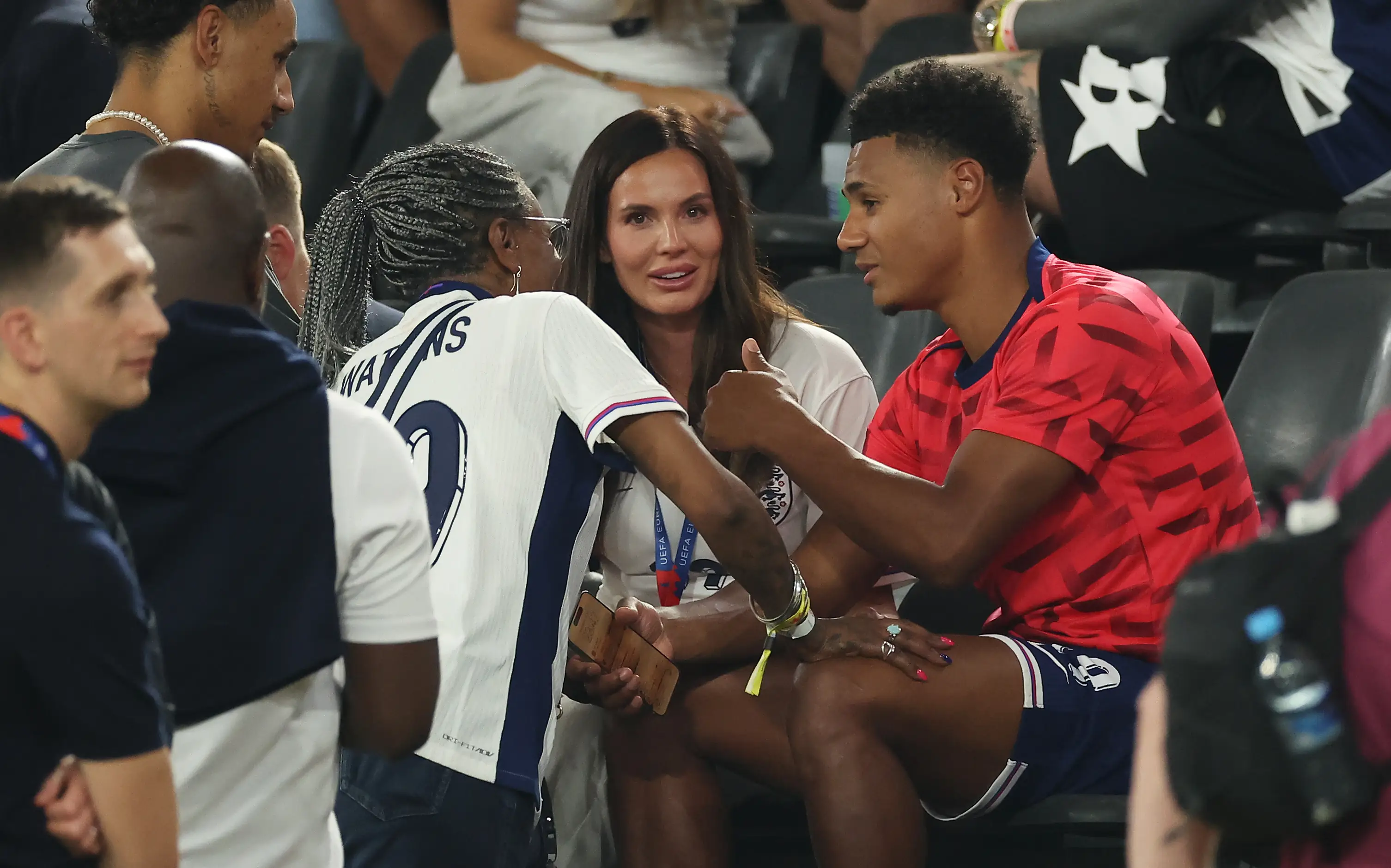 The striker seen debriefing his mum and girlfriend Ellie Alderson, 28, after bagging the winning goal (Richard Pelham/Getty Images)