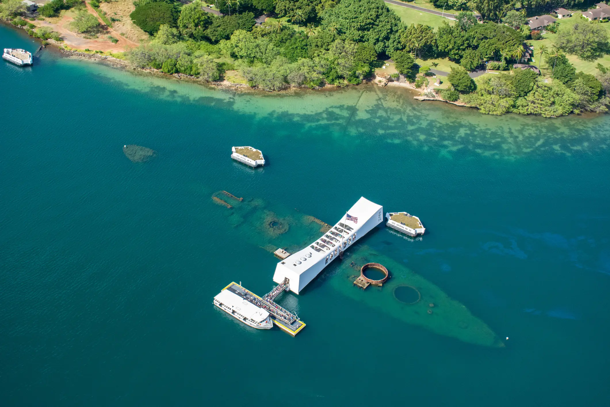 The USS Arizona memorial can still be seen in Honolulu to this day (Getty Stock)