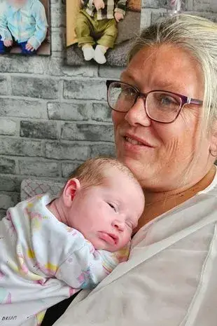 The mum, 38, explained she thought her labour pains were food poisoning after she ate a dodgy chicken curry (Kennedy News and Media)