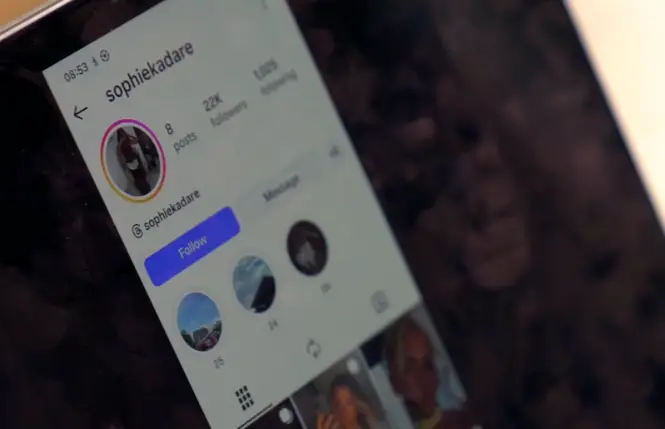 A fake account using Davies' image (BBC)