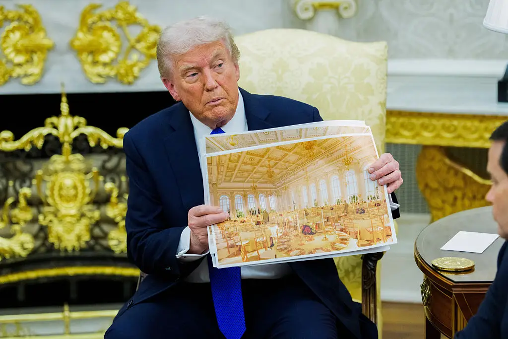 Trump has been busy showing off mock-ups of the ballroom, which are in his preferred glitzy gold style ( Aaron Schwartz/CNP/Bloomberg via Getty Images)