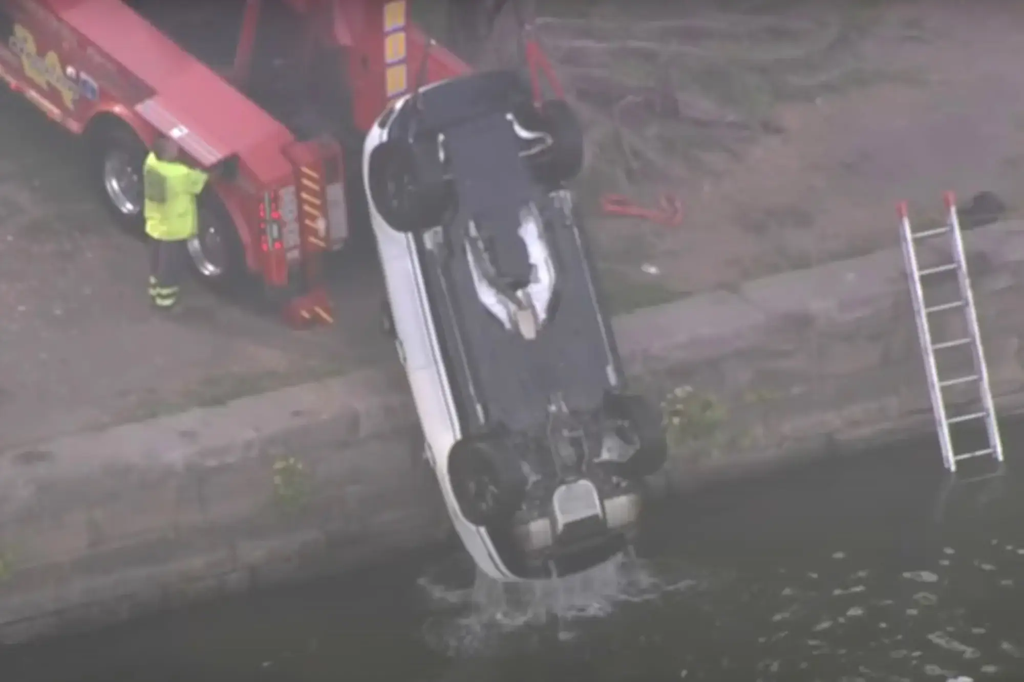 The couple made it back onto dry land safely, albeit soaking wet (CBS)