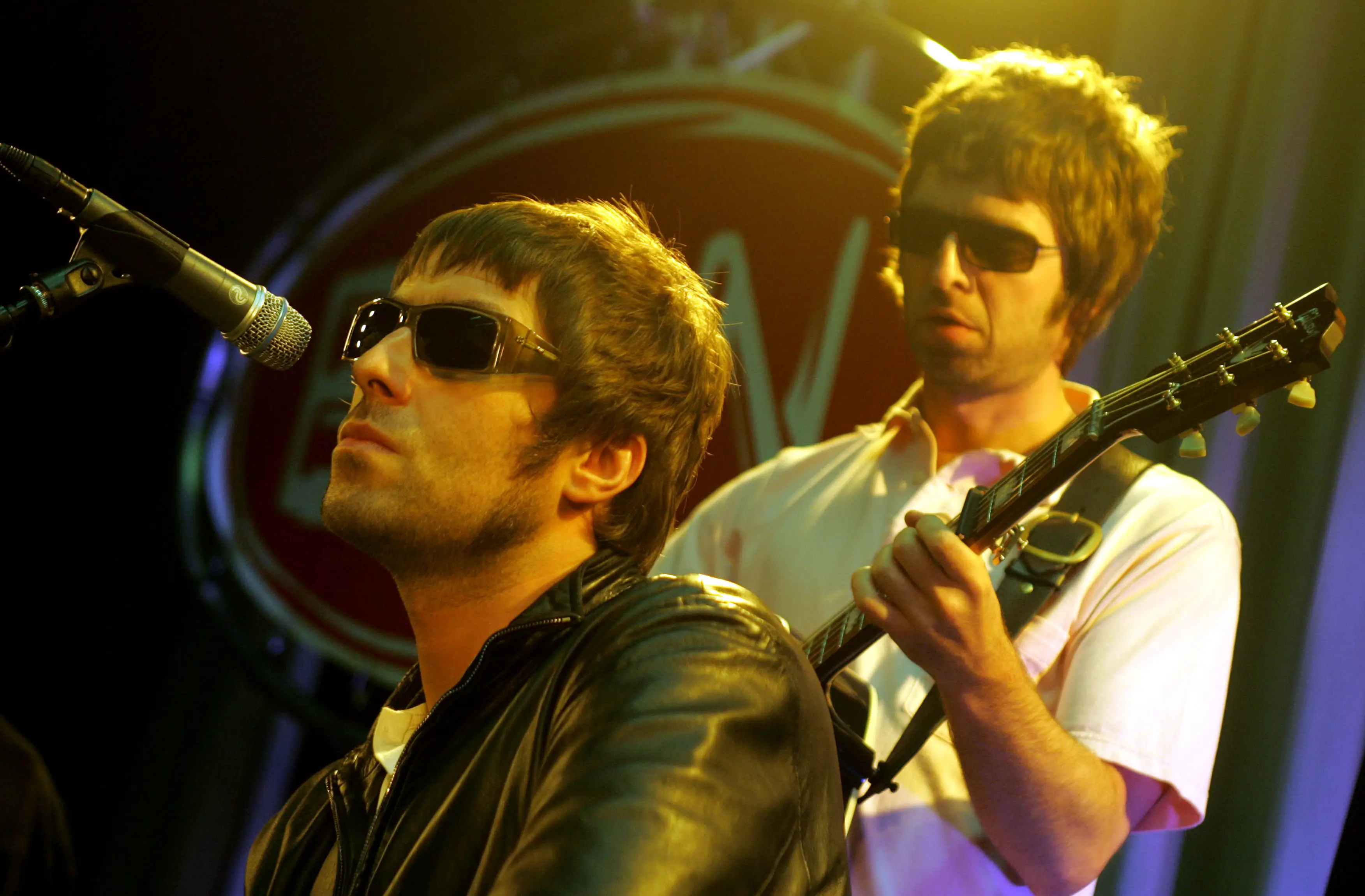 Liam and Noel Gallagher will reunite on stage this Friday (4 July) (Paul Bergen/Redferns)