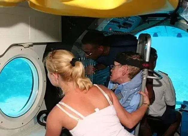 Hawking was previously pictured on a submarine tour around Epstein's private island (Department of Justice)