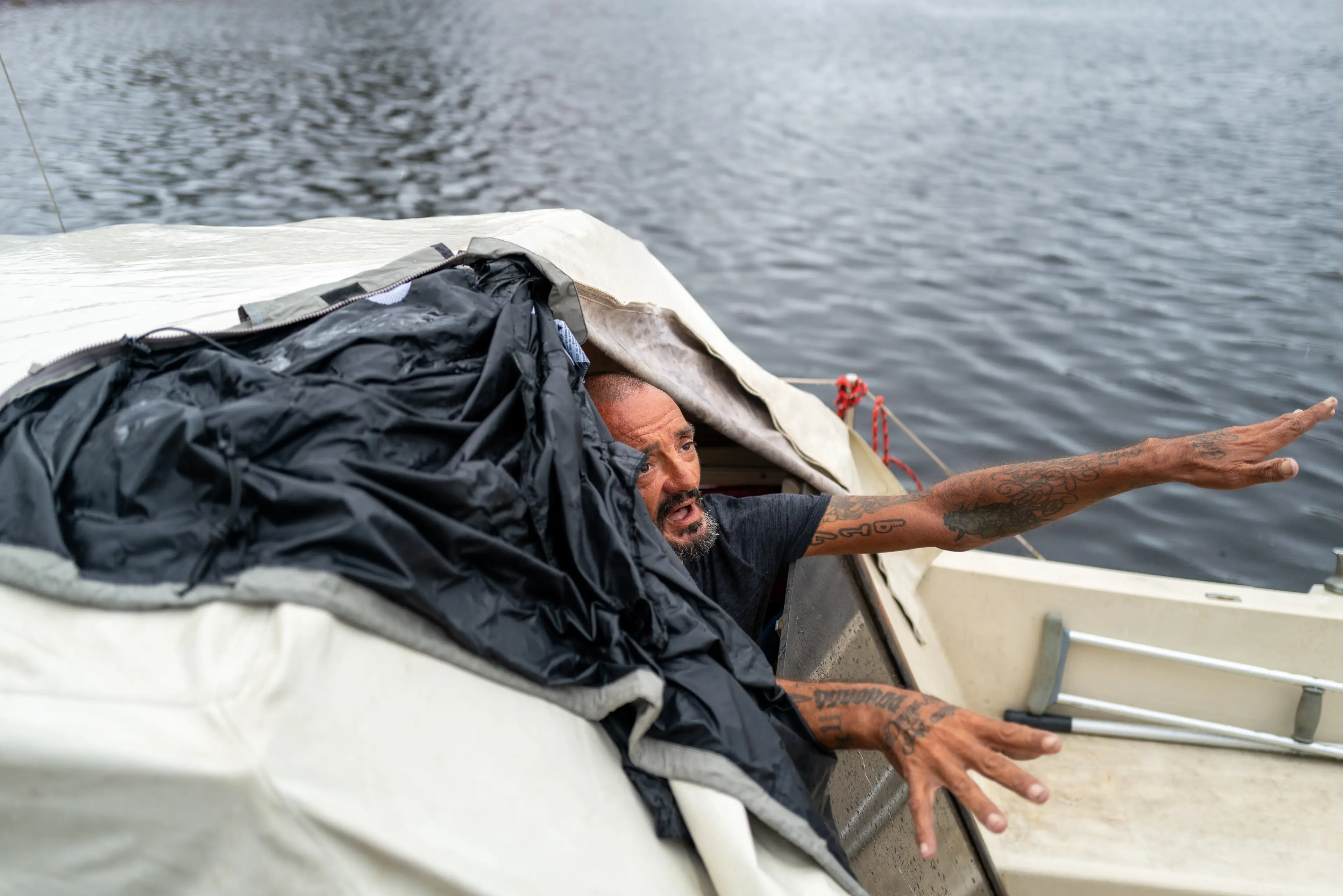 An update from a few hours ago had the man still in his boat and saying he was OK despite the hurricane (Spencer Platt/Getty Images)
