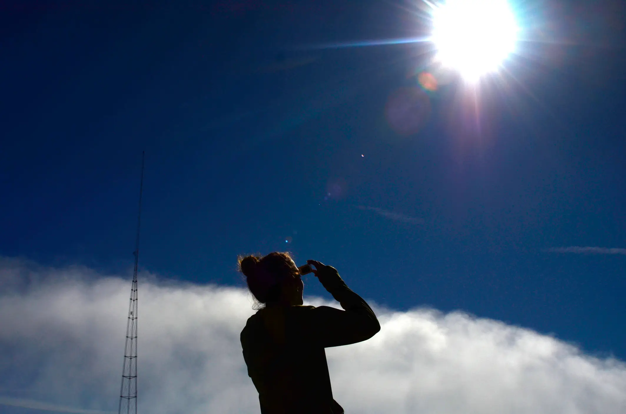 Protective glasses should always be used when looking at an eclipse. (Aaron McCoy/Getty Images)