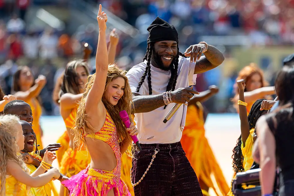 Burna Boy with Shakira (Bob Kupbens/Icon Sportswire via Getty Images)