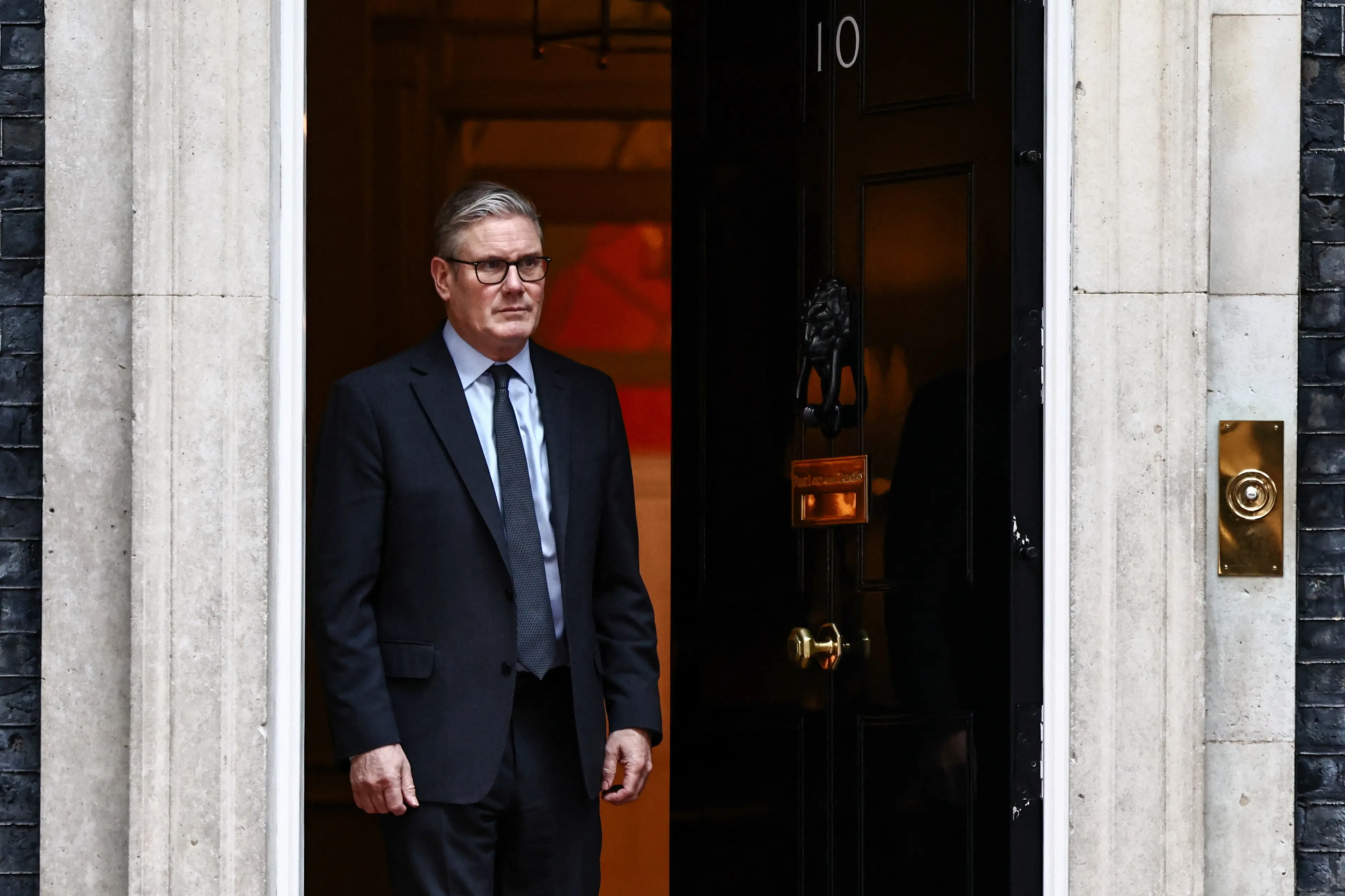 Starmer is now allowing the US to use British bases to launch strikes on Iran (Henry NICHOLLS / AFP via Getty Images)