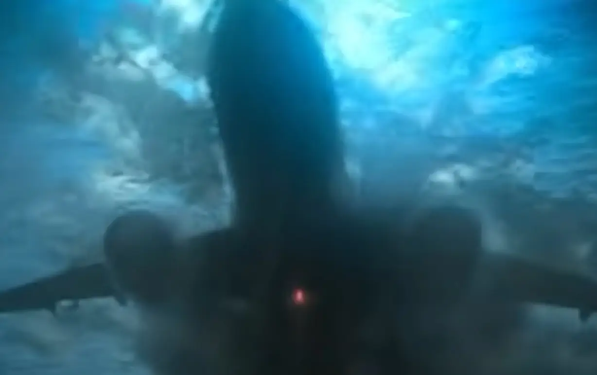 "Oh no, our plane has crashed into the sea! Hopefully there are no sharks nearby that will take advantage of the situation."