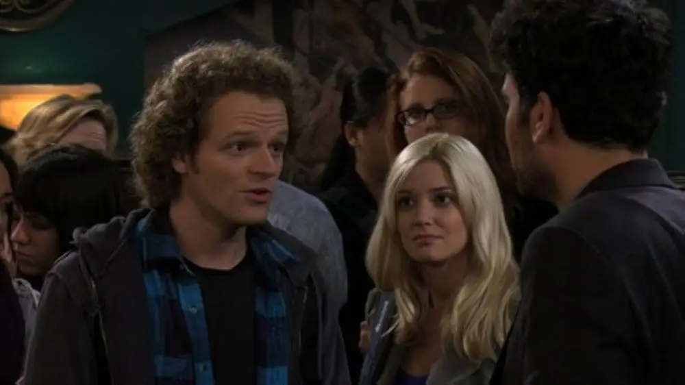Nick Pasqual (left) in How I Met Your Mother in 2011. (CBS)