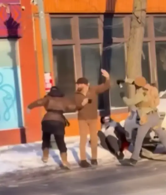 Pretti was shown in one video clutching his phone rather than a gun (NBC News)