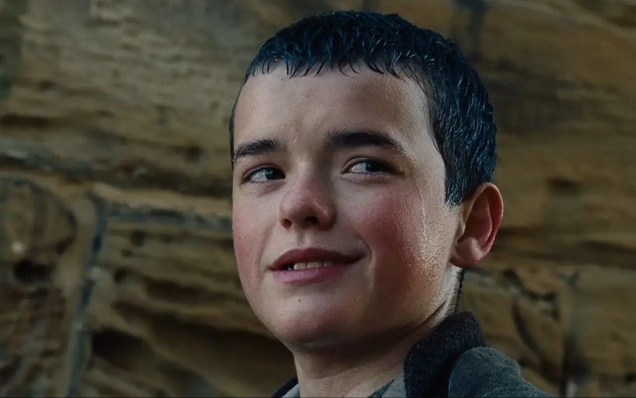 Cooper is introduced as young Heathcliffe in the shocking scene. (Warner Bros.)