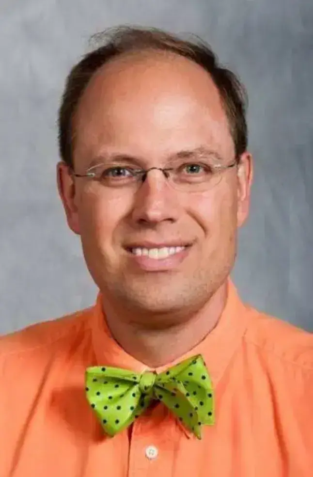 Professor Paul Fischer has been charged with count of criminal damage (Macalester College)