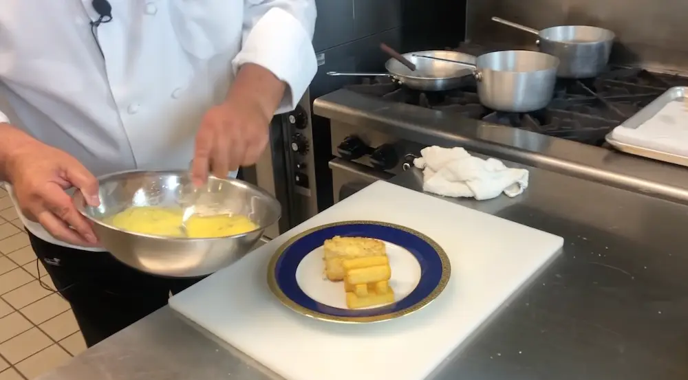 The Queen has a particular way of eating her fish and chips.