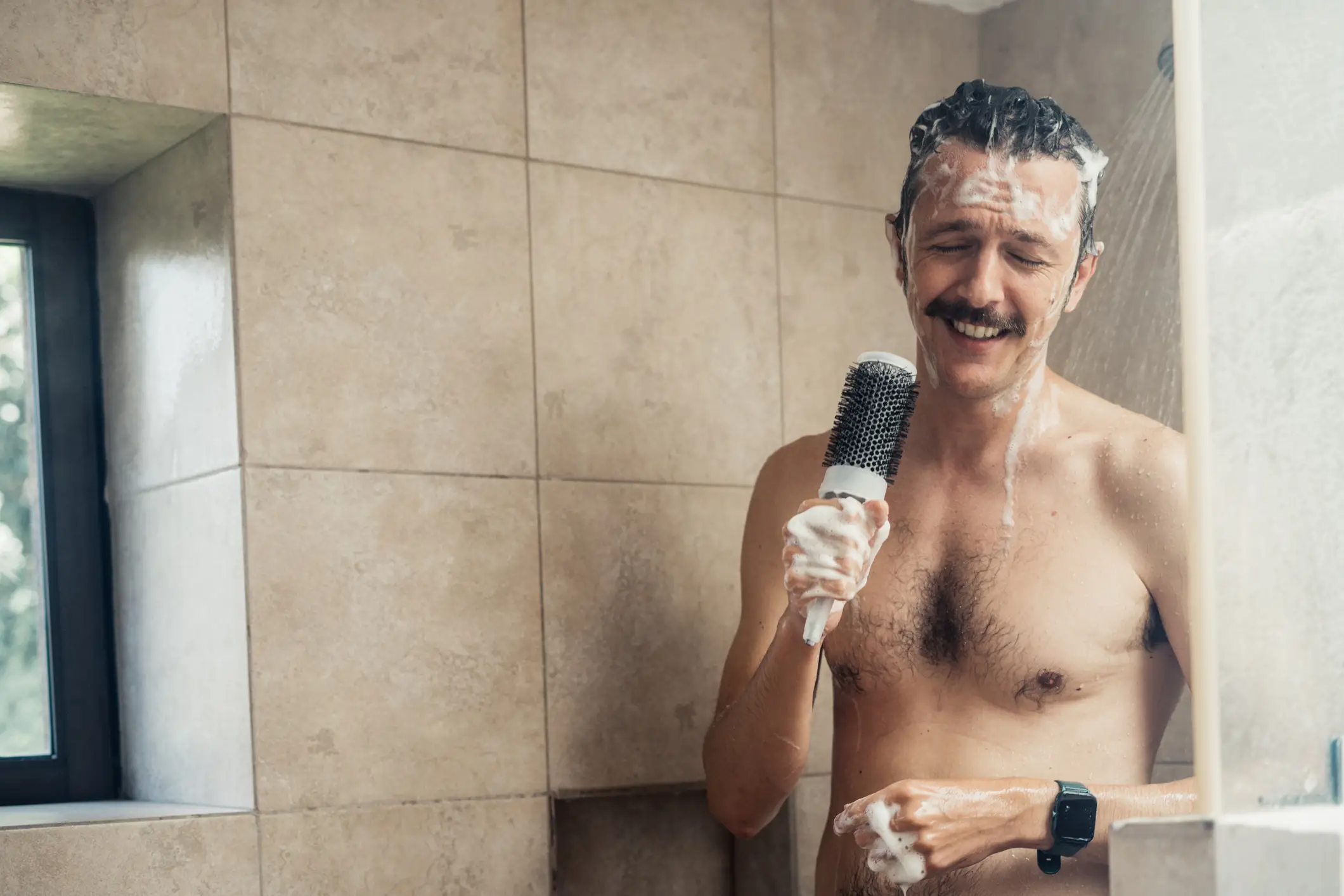 An expert has warned against listening to music in the shower (Orbon Alija/Getty Images)