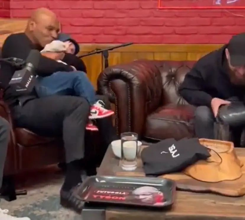 Tyson picked up Hasbulla and pretended to eat his ear. (YouTube / HotboxinwithMikeTyson)