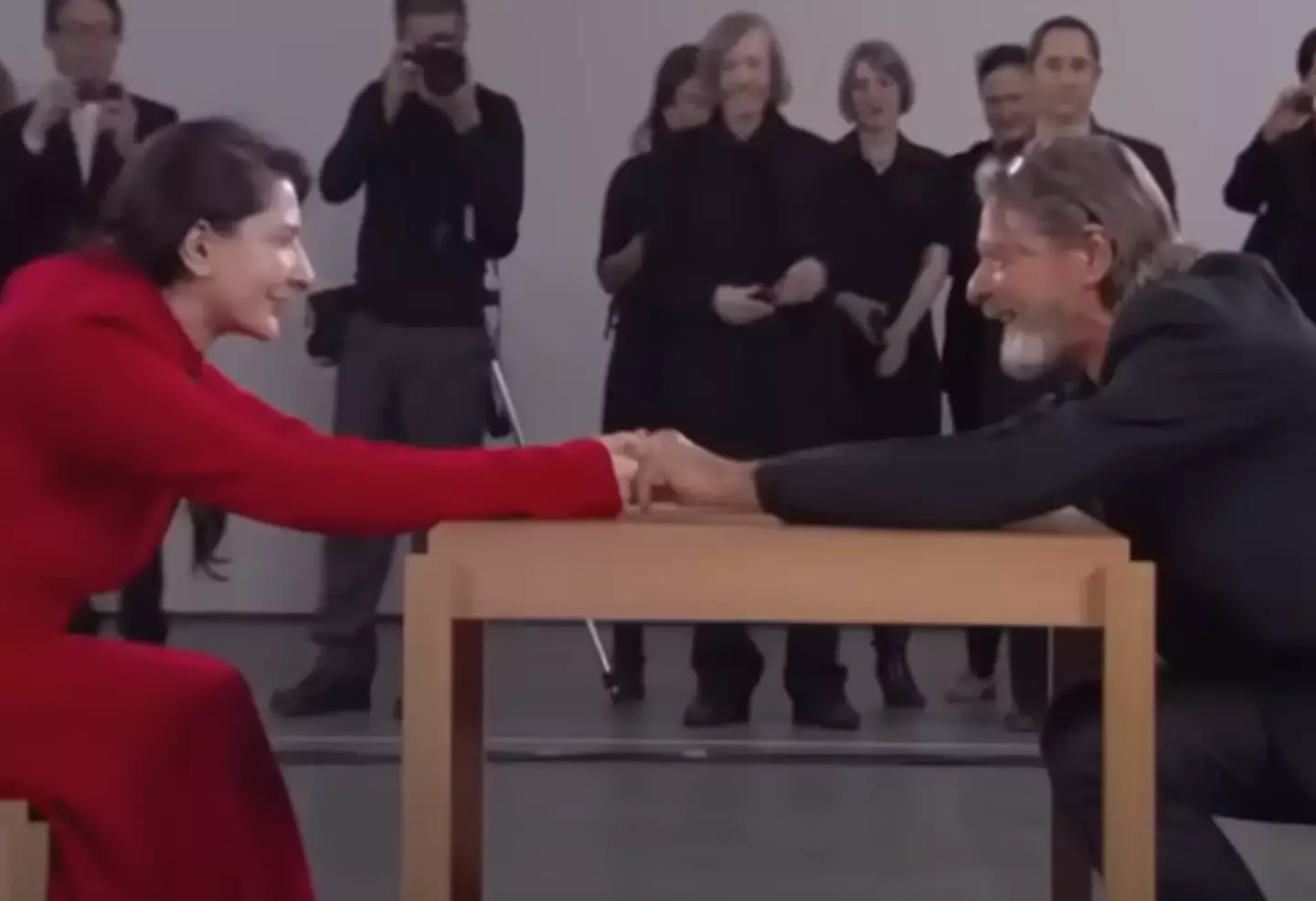 The artist broke her rule with her former partner as she reached across the table and they held hands (Museum of Modern Art)