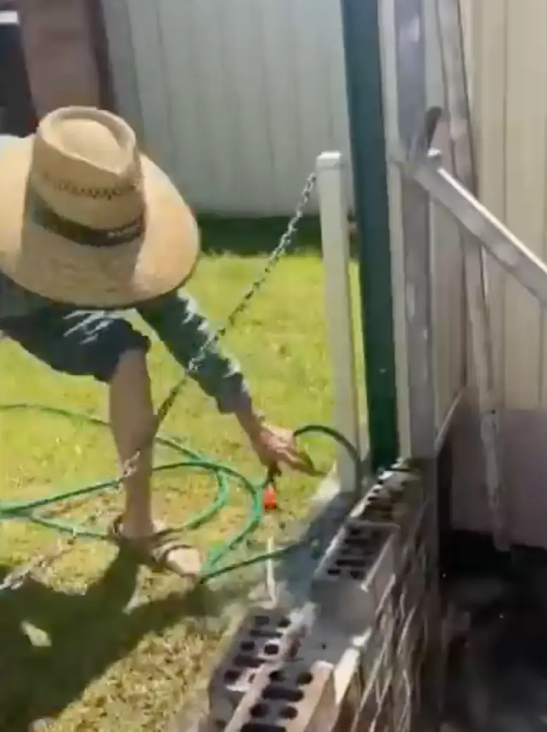 The neighbour kicked down the wall as the bricklayers worked on it.