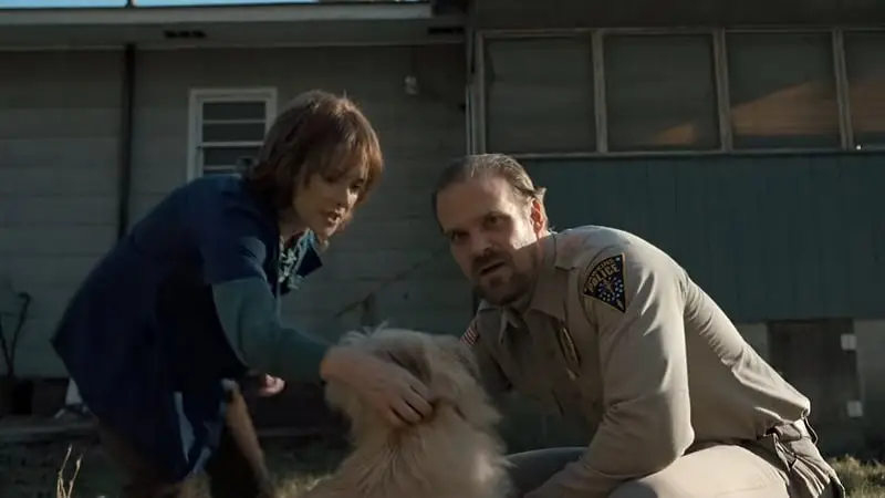 David Harbour previously said that Chester, seen in the background, was hard to work with (Netflix)