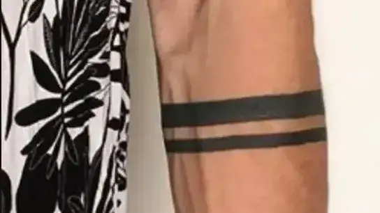Man with black band tattoo on arm that has ‘explicit’ meaning responds to question he is asked most