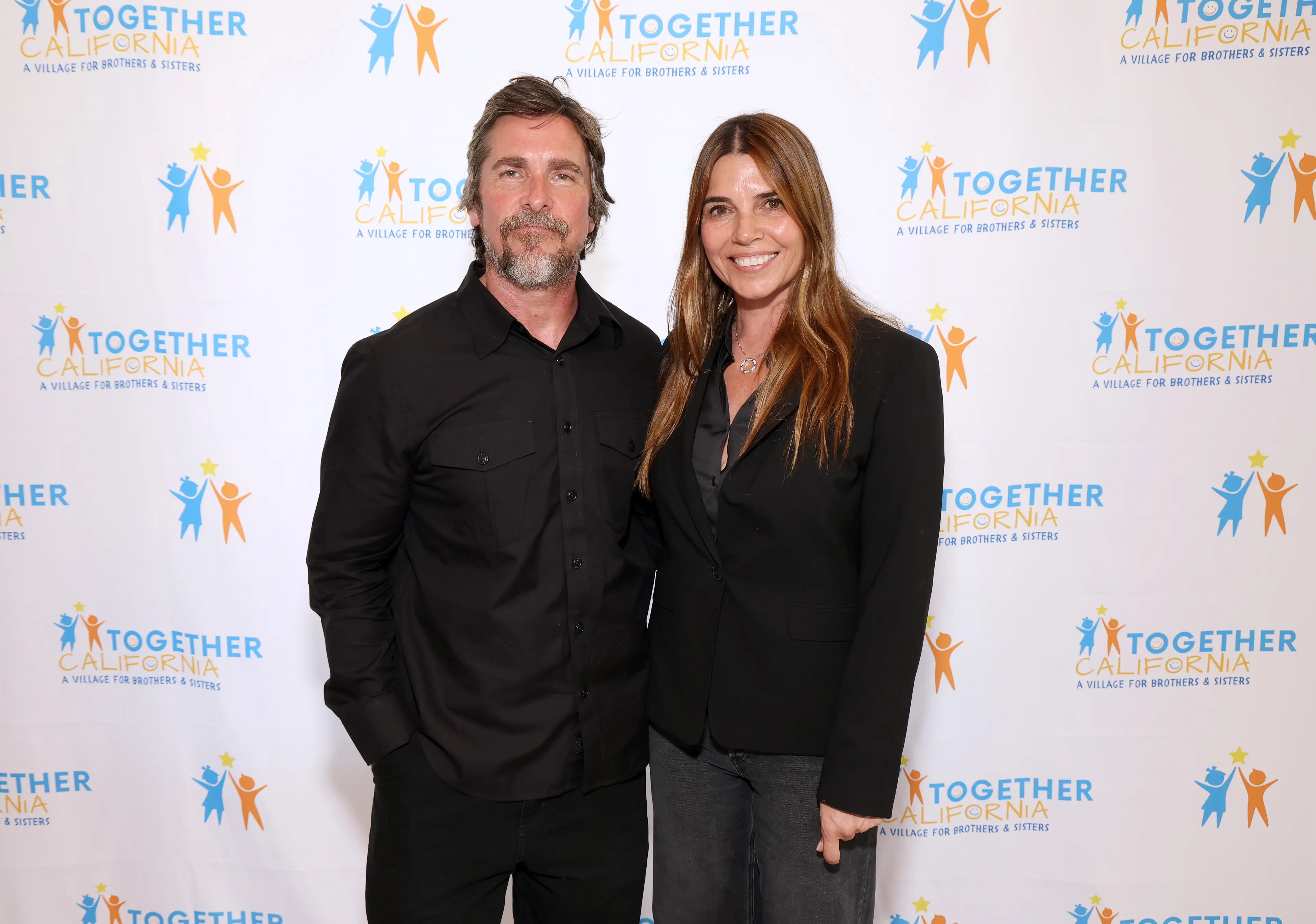 Bale and his wife Sibi attended the opening of the village (Jesse Grant/Getty Images for Together California)
