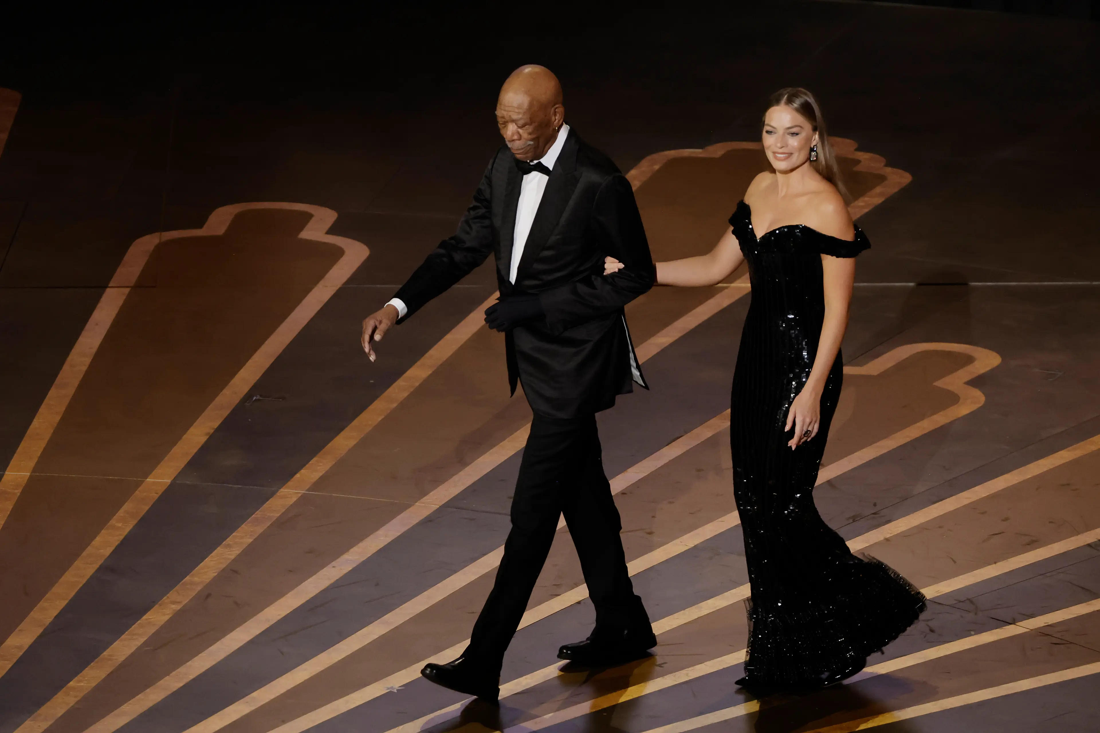 Morgan Freeman joined Margot Robbie onstage at the 2023 Oscars. (Kevin Winter/Getty Images)