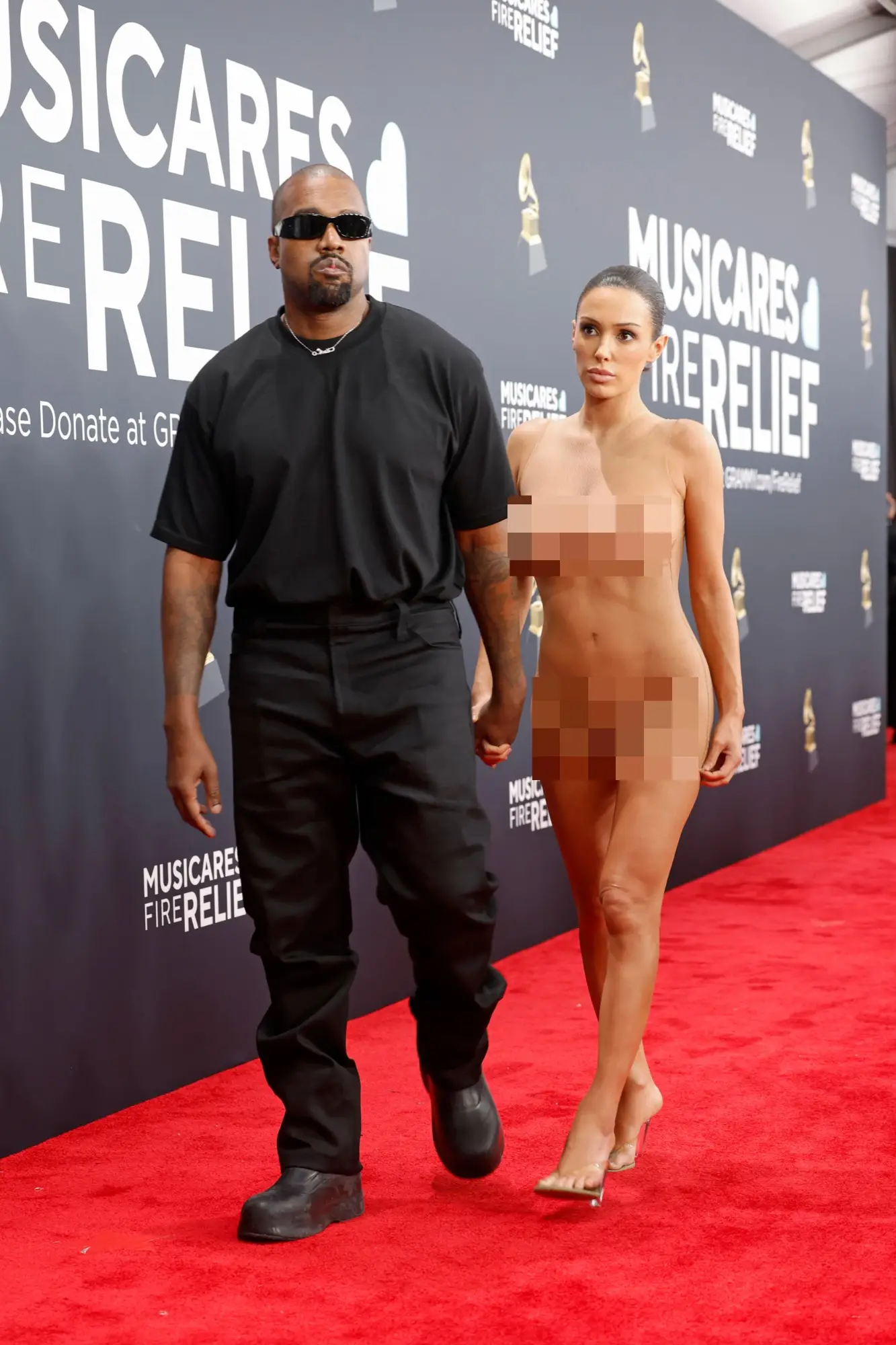 West walking the red carpet with current wife Bianca Censori at the 2025 Grammys (Frazer Harrison/Getty Images)