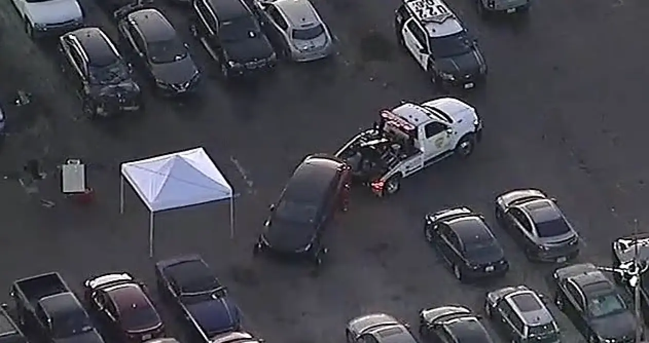 Footage from the tow lot showed the car being taken away (KABC)