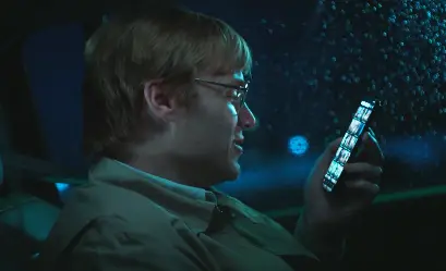 Dahmer is seen using a dating app (FX)