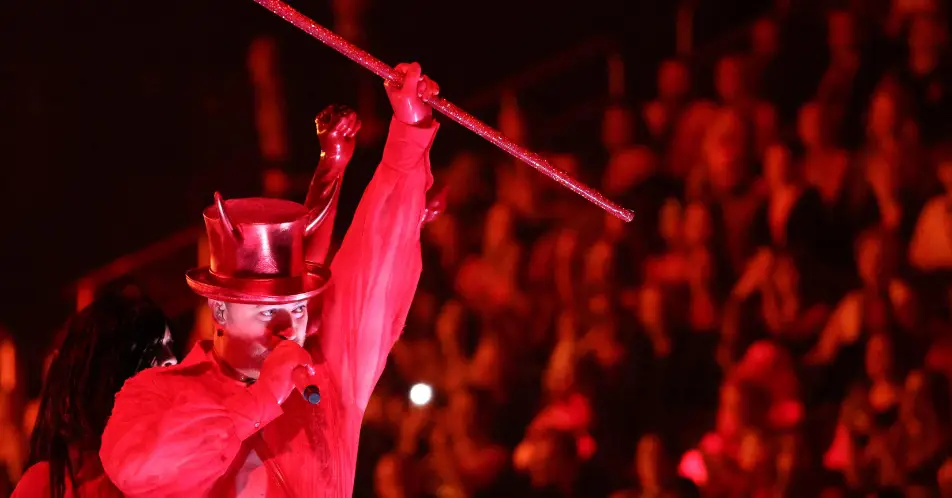 Sam Smith wore devil horns for the performance.