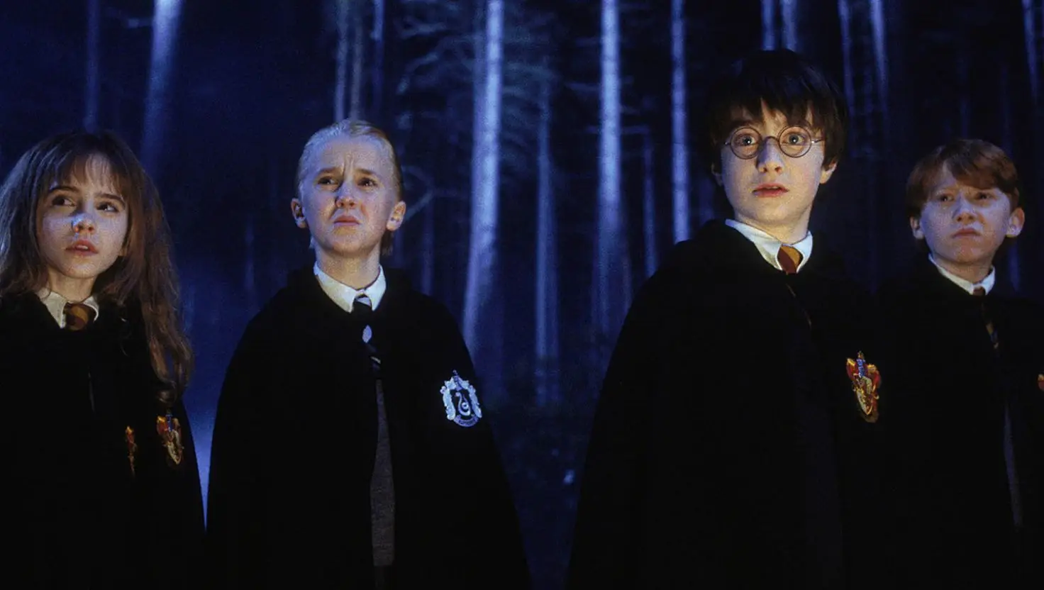 Left: Emma Watson, Tom Felton, Daniel Radcliffe and Rupert Grint in the Harry Potter franchise (Warner Bros.)