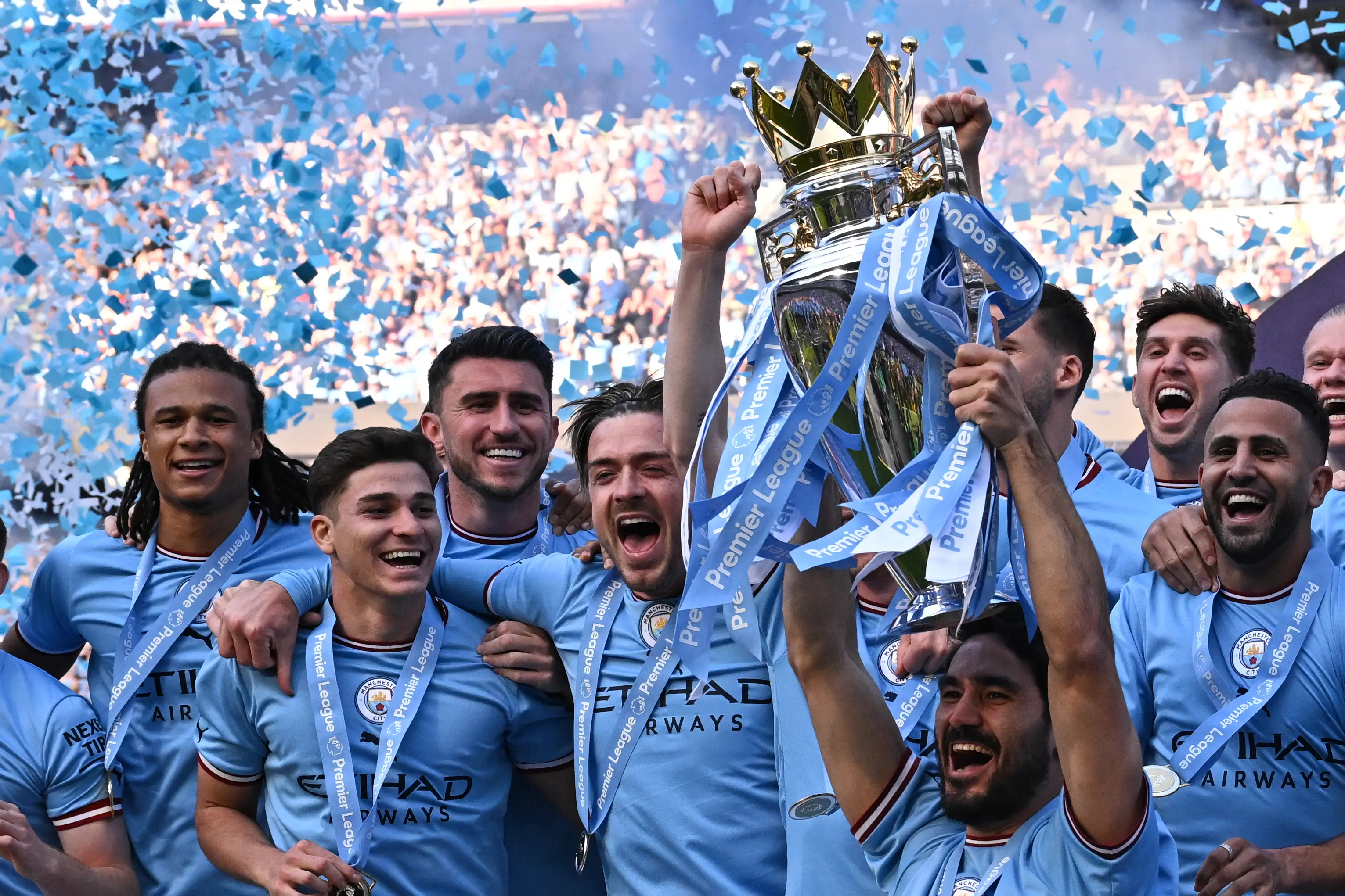 Man City stars seen celebrating their 2023 Premier League win (Oli SCARFF / AFP via Getty Images)