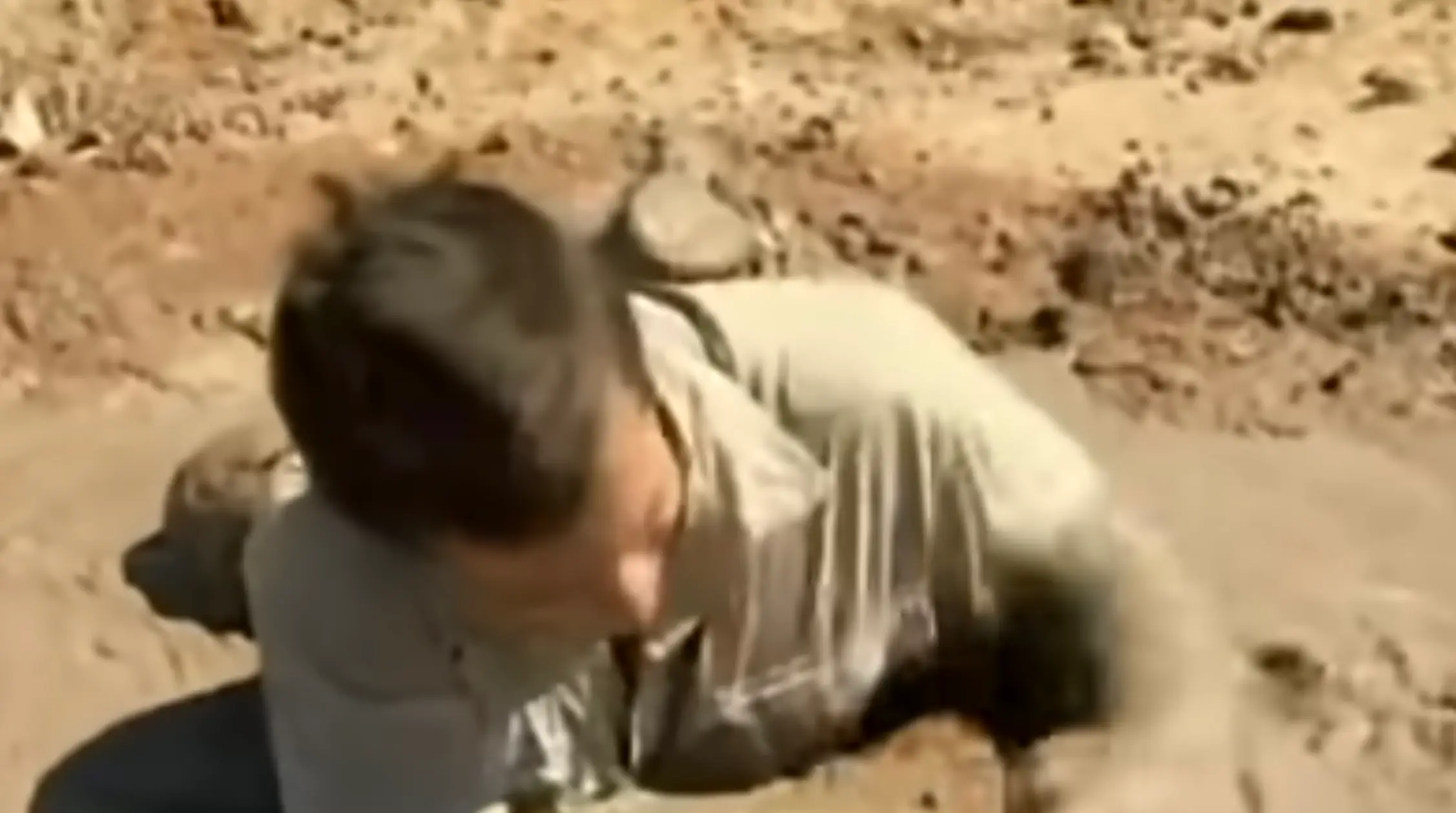 The survivalist showed how he 'monkey crawled' out of the thick mixture of sand and water (Discovery)