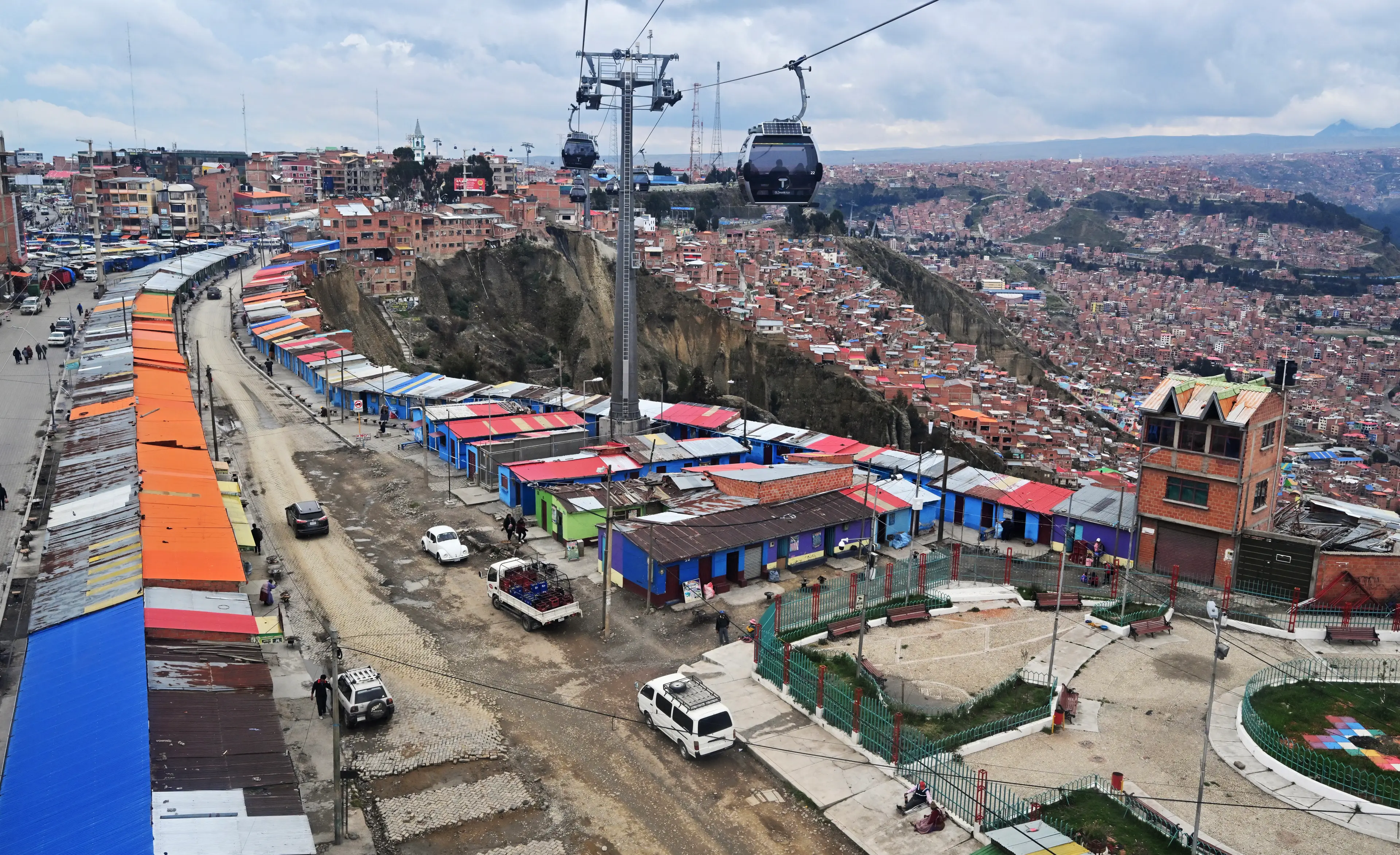 A deadly drop sits just feet away from their doorsteps (AIZAR RALDES/AFP via Getty Images)