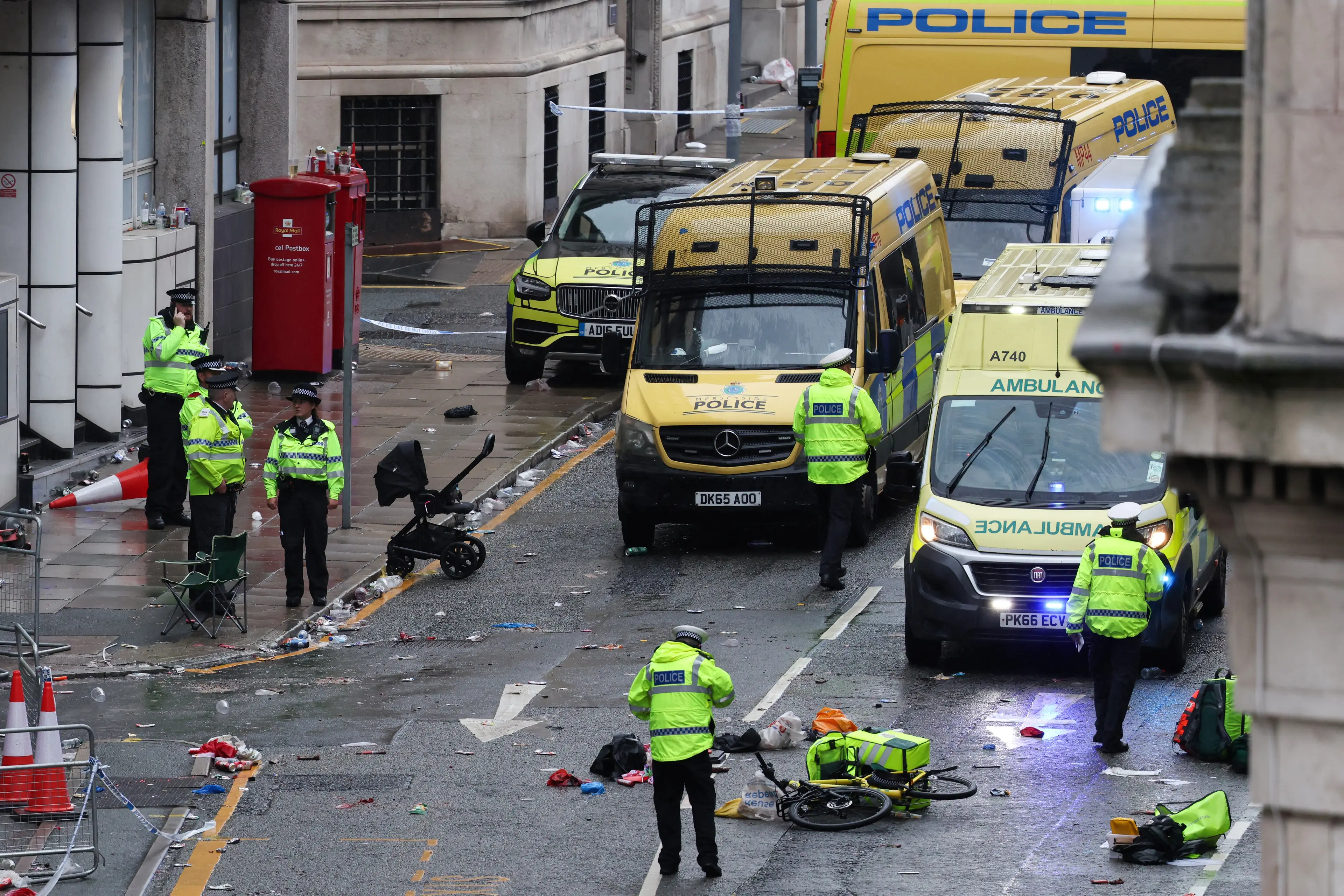 47 people were injured when a car was driven into a crowd of people at Liverpool FC's title parade, four children among them (DARREN STAPLES/AFP via Getty Images)