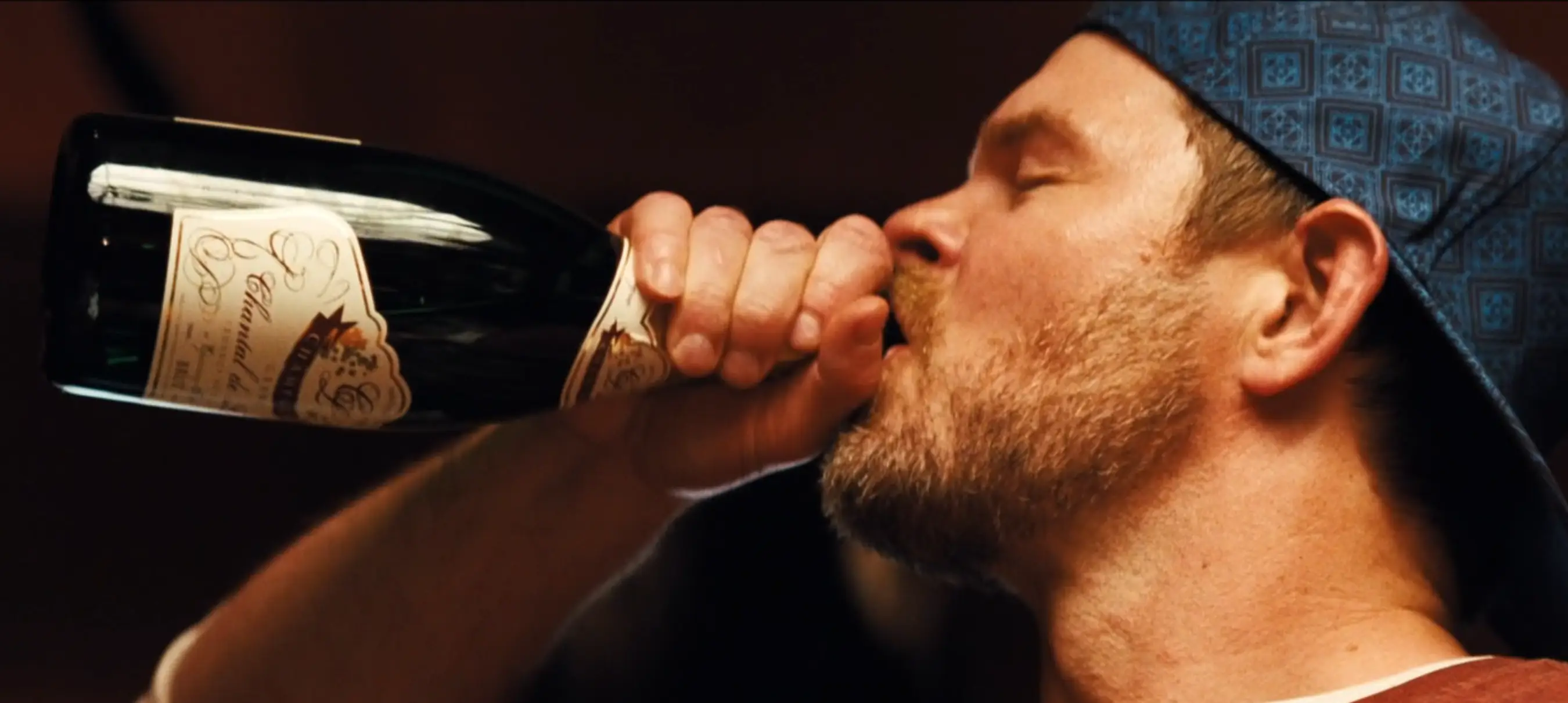 The man is shown seemingly penetrating Kitty with the champagne bottle (HBO)