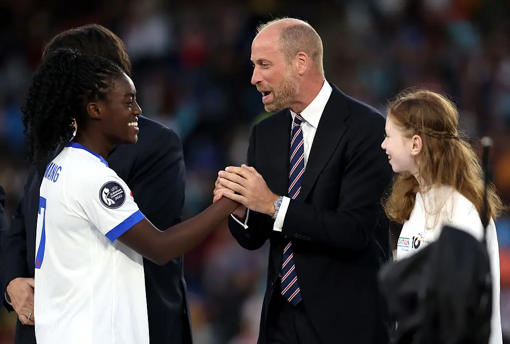 The 12-year-old was stood next to Prince William (Charlotte Wilson/Getty Images)