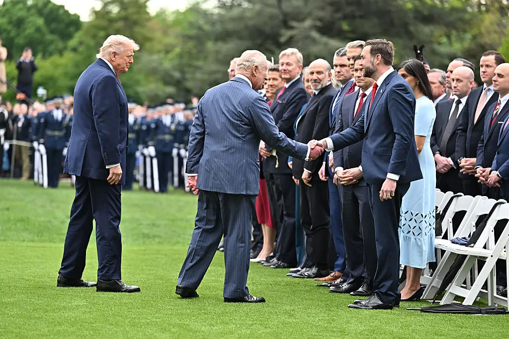 King Charles and Queen Camilla shook hands with American officials, Donald Trump strode in to shake hands with the UK delegation (Samir Hussein/WireImage)