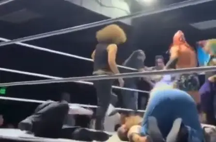 Another fighter was seen pinning Smith while the referee counted him out after the attack (X/Kick)