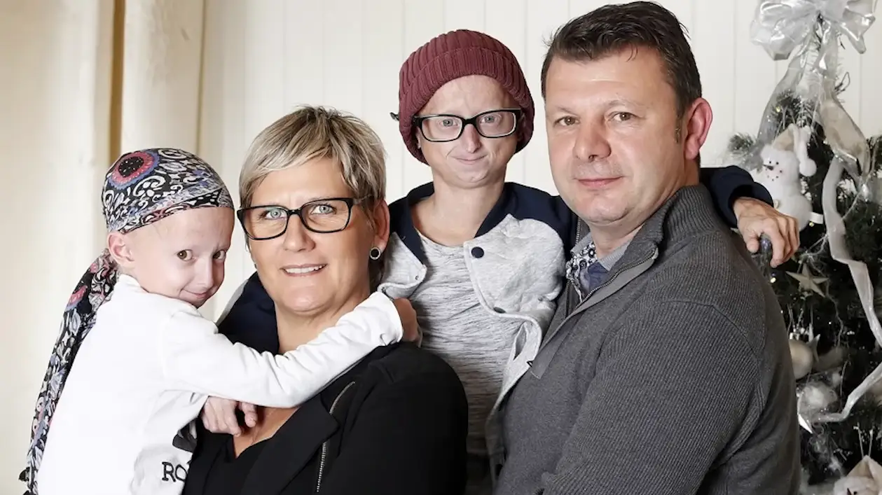 Michiel Vandeweert with his younger sister and parents (YouTube/TEDx Talks)