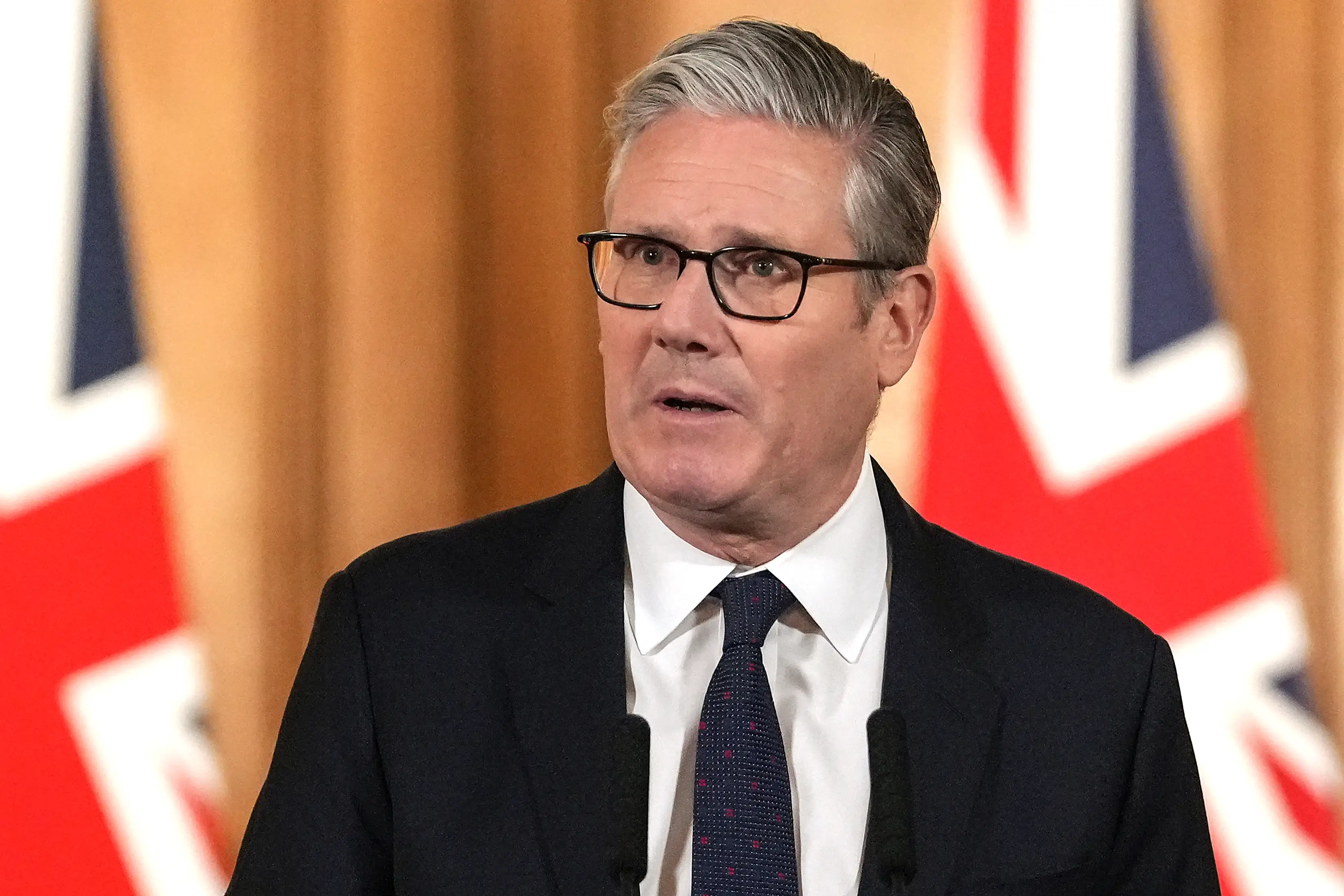 He announced the ban at a press conference in Downing Street. (Carlos Jasso/PA Wire)