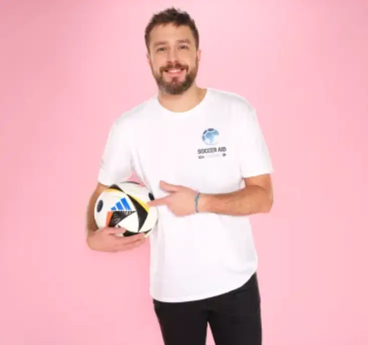 He returned to commentate Soccer Aid. (©UNICEF/Soccer Aid Productions/Stella Pictures)