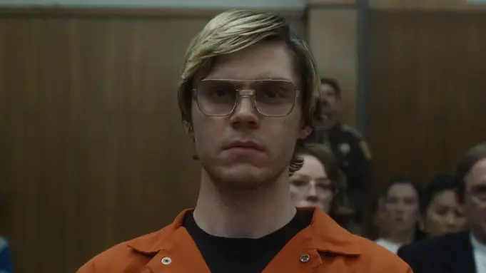 Evan Peters as Jeffrey Dahmer.