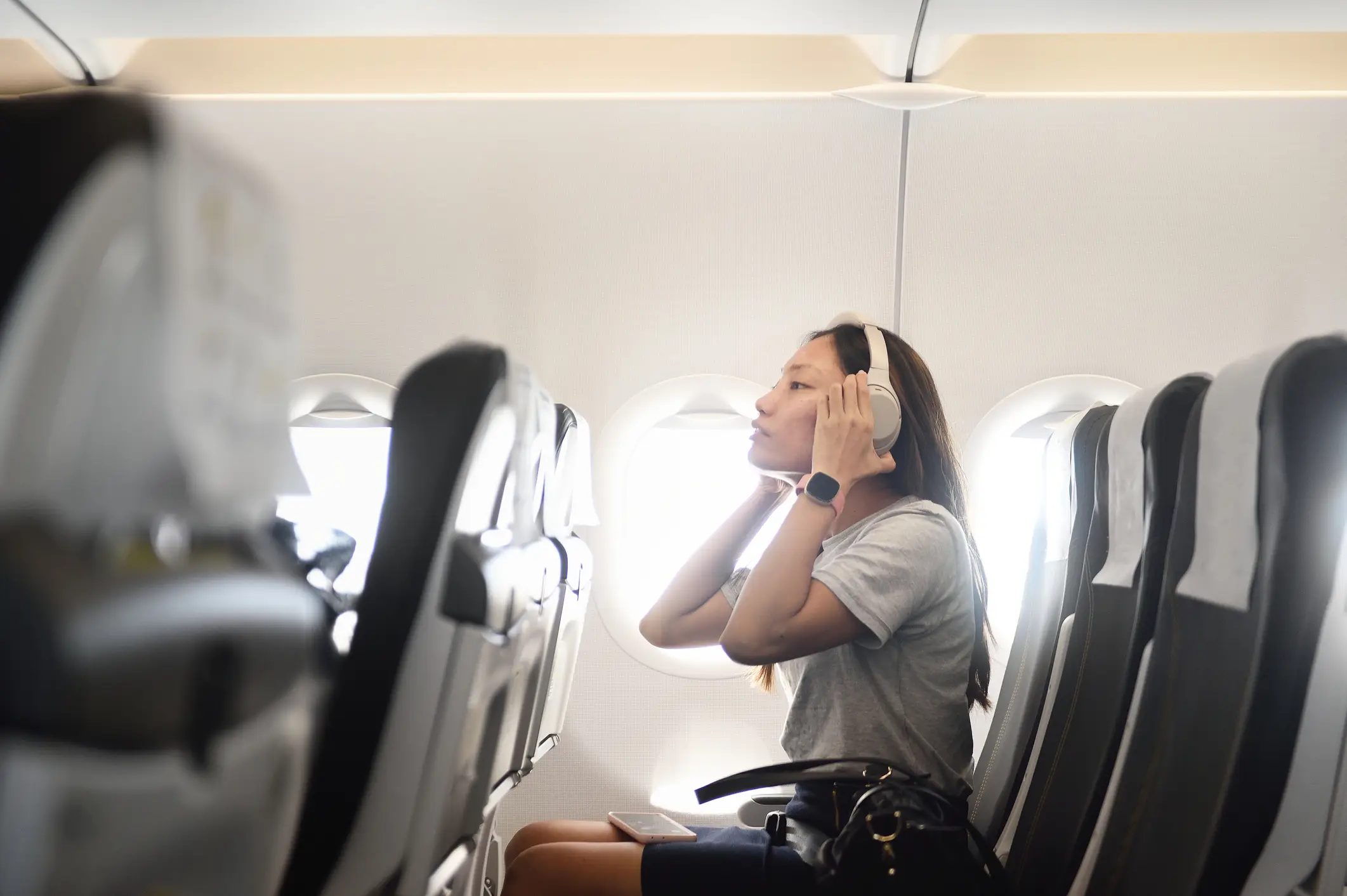 Listening to things without headphones is sometimes referred to as 'barebeating', but it's also just known as being rude (Getty Stock Photo)