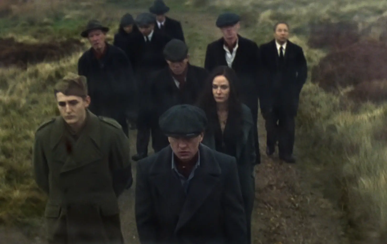 Charles is shown still in his military garb at Tommy's funeral (Netflix)